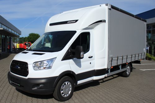 AG Zabudowy - Realizacja  Ford Transit - międzynarodówka z kabiną tylną, obustronną firanką i sprężynowym systemem zwijania plandeki z tyłu