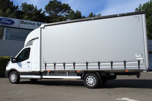 AG Zabudowy - Realizacje - Ford Transit - międzynarodówka z kabiną tylną, obustronną firanką i sprężynowym systemem zwijania plandeki z tyłu