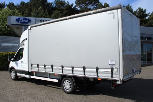 AG Zabudowy - Realizacje - Ford Transit - międzynarodówka z kabiną tylną, obustronną firanką i sprężynowym systemem zwijania plandeki z tyłu