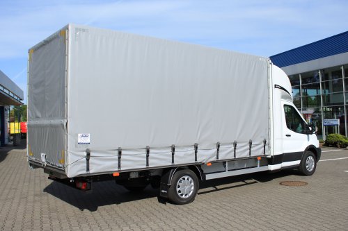 AG Zabudowy - Realizacje - Ford Transit - międzynarodówka z kabiną tylną, obustronną firanką i sprężynowym systemem zwijania plandeki z tyłu