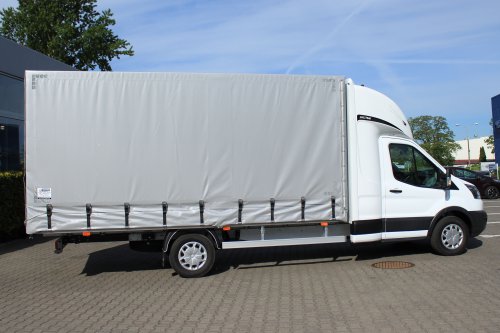 AG Zabudowy - Realizacje - Ford Transit - międzynarodówka z kabiną tylną, obustronną firanką i sprężynowym systemem zwijania plandeki z tyłu