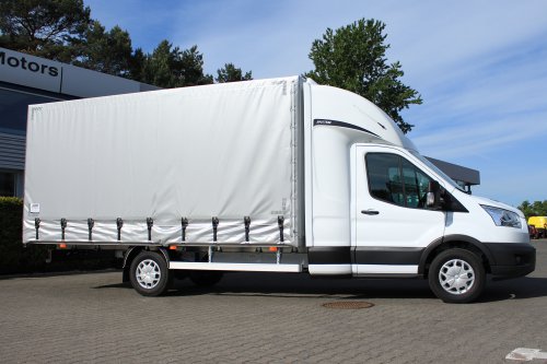 AG Zabudowy - Realizacje - Ford Transit - międzynarodówka z kabiną tylną, obustronną firanką i sprężynowym systemem zwijania plandeki z tyłu
