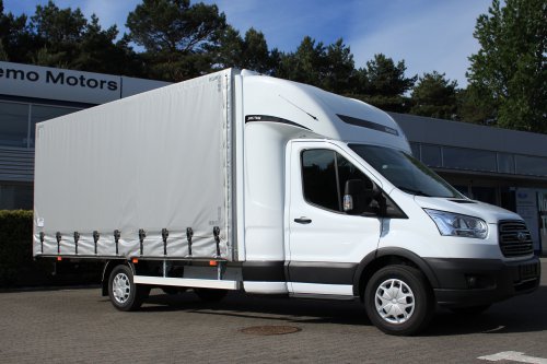 AG Zabudowy - Realizacje - Ford Transit - międzynarodówka z kabiną tylną, obustronną firanką i sprężynowym systemem zwijania plandeki z tyłu